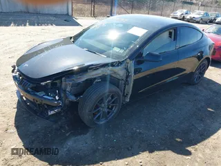 2023 Tesla Model 3 Long Range with VIN 5YJ3E1EB1PF632595, listed as a IAAI auction lot 41754131 with 8,147 mi miles and . Bid and sale history available at DreamBid. Image 2.