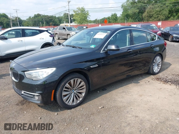 2014 BMW 5 Series GT 535i Gran Turismo xDrive with VIN WBA5M4C56ED183815, listed as a IAAI auction lot 40100547 with 150,358 mi miles and . Bid and sale history available at carsss.com. Image 2.