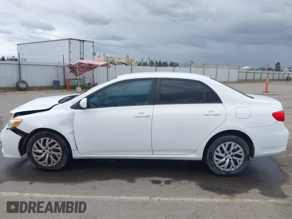 2011 Toyota Corolla L with VIN 2T1BU4EE6BC638383, listed as a IAAI auction lot 41934082 with 130,889 mi miles. Bid and sale history available at carsss.com. Image 14.