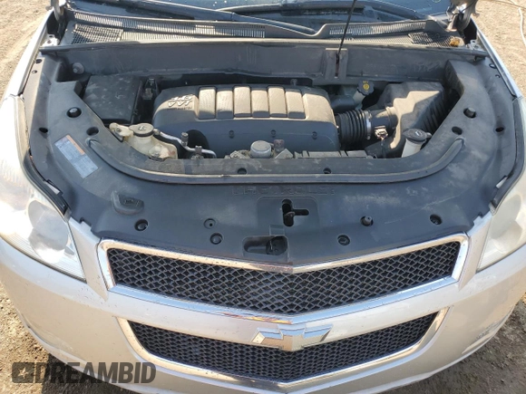 2011 Chevrolet Traverse 1LT z VIN 1GNKRGED9BJ403885, wystawiony jako Copart lot #56929765 z przebiegiem Nie podano mil oraz Szkoda całkowita • Salvage title. Historia ofert i sprzedaży dostępna na DreamBid. Obrazek 12.