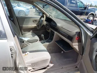 1997 Nissan Altima XE with VIN 1N4BU31D8VT205299, listed as a IAAI auction lot 42081935 with 235,426 mi miles. Bid and sale history available at carsss.com. Image 5.