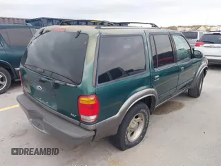 2000 Ford Explorer XLT z VIN 1FMZU63EXYZA22693, wystawiony jako IAAI lot #41350520 z przebiegiem 244 843 mil mil oraz . Historia ofert i sprzedaży dostępna na DreamBid. Obrazek 4.