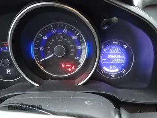 2016 Honda Fit EX with VIN JHMGK5H77GX022973, listed as a IAAI auction lot 42087380 with 96,439 mi miles and . Bid and sale history available at DreamBid. Image 7.