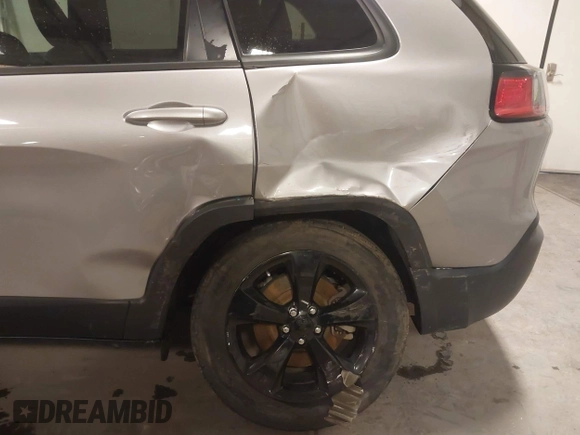 2019 Jeep Cherokee Latitude Plus with VIN 1C4PJMLX2KD427395, listed as a IAAI auction lot 41586532 with 84,033 mi miles and . Bid and sale history available at DreamBid. Image 6.