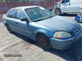 1998 Honda Civic LX z VIN 1HGEJ6677WL033502, wystawiony jako IAAI lot #42234067 z przebiegiem 263 955 mil mil oraz . Historia ofert i sprzedaży dostępna na DreamBid. Obrazek 1.