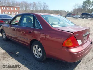 2002 Toyota Avalon XL with VIN 4T1BF28B62U243585, listed as a IAAI auction lot 41971701 with 87,205 mi miles. Bid and sale history available at carsss.com. Image 3.
