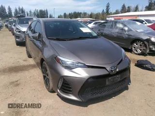2017 Toyota Corolla L z VIN 2T1BURHE3HC813738, wystawiony jako IAAI lot #37140043 z przebiegiem 240 652 mil mil oraz . Historia ofert i sprzedaży dostępna na DreamBid. Obrazek 1.