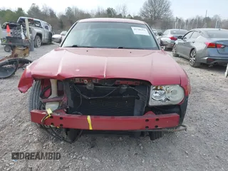 2006 Chrysler 300 C with VIN 2C3LA63H26H421354, listed as a IAAI auction lot 41706454 with 113,647 mi miles. Bid and sale history available at carsss.com. Image 6.