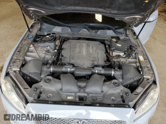 2013 Jaguar XJ with VIN SAJWJ1CD1D8V51462, listed as a Copart auction lot 50527985 with 62,995 mi miles and Salvage title. Bid and sale history available at DreamBid. Image 11.