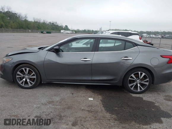 2016 Nissan Maxima SV with VIN 1N4AA6AP7GC449545, listed as a IAAI auction lot 41850689 with 97,859 mi miles and . Bid and sale history available at DreamBid. Image 14.