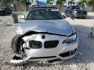 2016 BMW 2 Series 228i with VIN WBA1K9C57GV321957, listed as a Copart auction lot 59200583 with 65,761 mi miles. Bid and sale history available at carsss.com. Image 5.