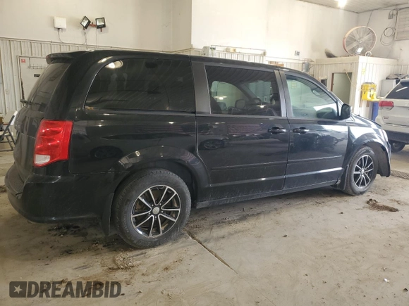 2014 Dodge Grand Caravan SXT 30th Anniversary with VIN 2C4RDGCG1ER200489, listed as a Copart auction lot 52558915 with 127,035 mi miles and Salvage Title. Bid and sale history available at DreamBid. Image 3.