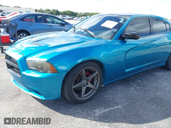 2012 Dodge Charger SXT with VIN 2C3CDXHG0CH185859, listed as a IAAI auction lot 40816799 with 132,572 mi miles. Bid and sale history available at carsss.com. Image 6.