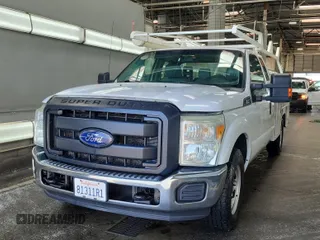 2015 Ford F-250 XLT with VIN 1FT7X2AT2FEB61007, listed as a IAAI auction lot 42663794 with 303,185 mi miles and . Bid and sale history available at DreamBid. Image 2.