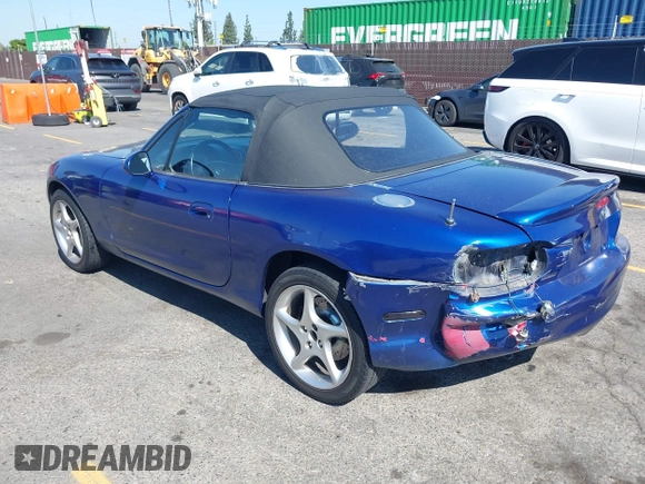 2003 Mazda MX-5 Miata Cloth z VIN JM1NB353830301964, wystawiony jako IAAI lot #42317534 z przebiegiem 192 342 mil mil oraz . Historia ofert i sprzedaży dostępna na DreamBid. Obrazek 3.