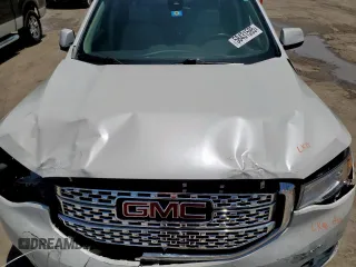 2017 GMC Acadia Denali with VIN 1GKKNPLS8HZ327113, listed as a Copart auction lot 58431595 with 102,061 mi miles and Salvage title. Bid and sale history available at DreamBid. Image 11.
