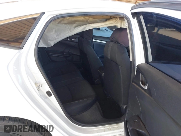2020 Honda Civic LX with VIN 19XFC2F66LE007328, listed as a IAAI auction lot 41852111 with 135,956 mi miles and . Bid and sale history available at DreamBid. Image 8.
