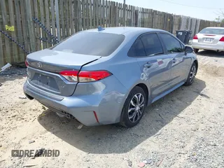 2021 Toyota Corolla LE with VIN JTDEPMAE2MJ148539, listed as a IAAI auction lot 42137624 with 67,983 mi miles and . Bid and sale history available at DreamBid. Image 4.