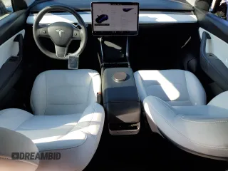 2020 Tesla Model Y Long Range with VIN 5YJYGDEE8LF034719, listed as a Copart auction lot 50888365 with 55,307 mi miles and Salvage Title. Bid and sale history available at DreamBid. Image 8.