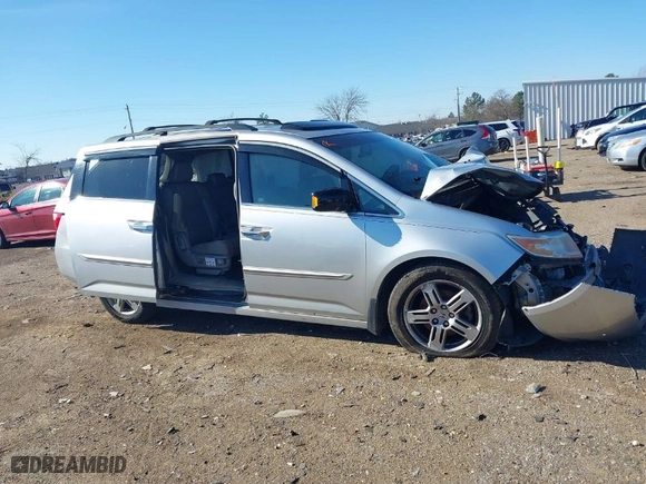 2012 Honda Odyssey Touring with VIN 5FNRL5H99CB022857, listed as a IAAI auction lot 41643504 with NaN miles. Bid and sale history available at carsss.com. Image 12.