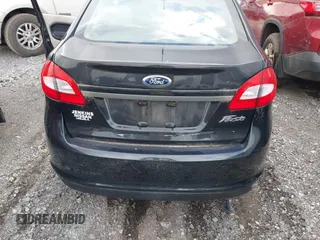 2013 Ford Fiesta S z VIN 3FADP4AJ5DM143885, wystawiony jako IAAI lot #42743132 z przebiegiem Nie podano mil oraz . Historia ofert i sprzedaży dostępna na DreamBid. Obrazek 6.