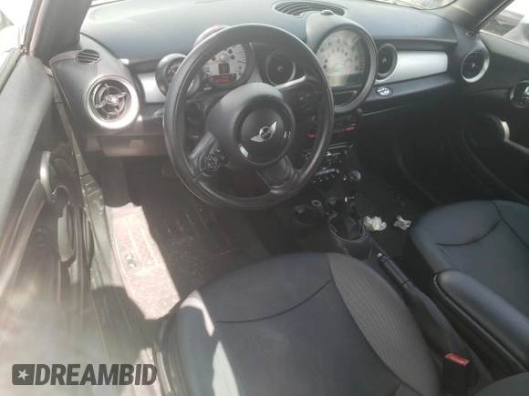 2012 MINI Convertible с VIN WMWZN3C5XCT134595, выставлен на аукционе Copart как лот 52752455 с пробегом 145 915 миль миль и Чистый • Clean title. История ставок и продаж доступна на DreamBid. Изображение 8.