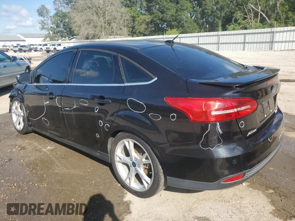 2015 Ford Focus Titanium with VIN 1FADP3J29FL311471, listed as a Copart auction lot 87805235 with 195,026 mi miles and Salvage Title. Bid and sale history available at carsss.com. Image 2.