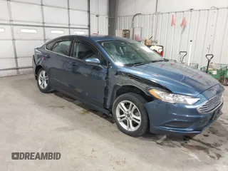 2018 Ford Fusion SE z VIN 3FA6P0HD2JR259707, wystawiony jako IAAI lot #40616115 z przebiegiem 74 318 mil mil oraz . Historia ofert i sprzedaży dostępna na DreamBid. Obrazek 1.