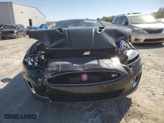 2015 Jaguar XK with VIN SAJWA4DCXFMB55227, listed as a Copart auction lot 48455465 with 64,050 mi miles and Salvage Title. Bid and sale history available at carsss.com. Image 5.