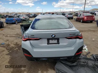 2022 BMW 4 Series M440i xDrive with VIN WBA13AW0XNFM27700, listed as a Copart auction lot 48406425 with Not provided miles and Salvage title. Bid and sale history available at DreamBid. Image 6.