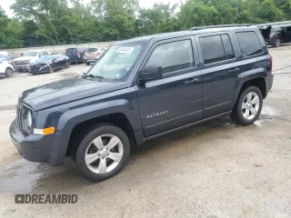 2014 Jeep Patriot Latitude with VIN 1C4NJRFB0ED649779, listed as a Copart auction lot 60444435 with 161,009 mi miles and Salvage title. Bid and sale history available at DreamBid. Image 1.