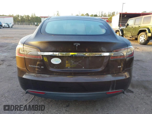 2014 Tesla Model S 60 z VIN 5YJSA1H19EFP51406, wystawiony jako IAAI lot #41561395 z przebiegiem Nie podano mil oraz . Historia ofert i sprzedaży dostępna na DreamBid. Obrazek 16.