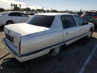 1995 Cadillac Concours z VIN 1G6KF52Y0SU301356, wystawiony jako Copart lot #77372694 z przebiegiem 132 934 mil mil oraz Szkody całkowita. Historia ofert i sprzedaży dostępna na DreamBid. Obrazek 3.