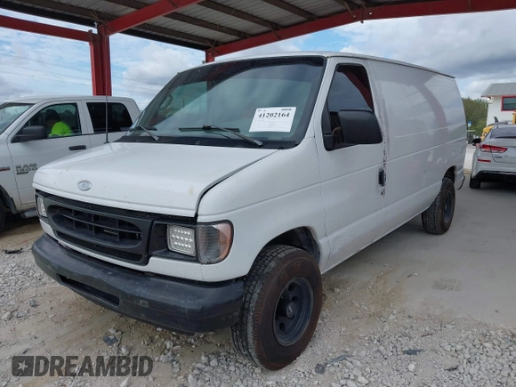 2001 Ford Econoline Cargo with VIN 1FTRE14261HA22632, listed as a IAAI auction lot 41202164 with 153,412 mi miles and . Bid and sale history available at DreamBid. Image 2.
