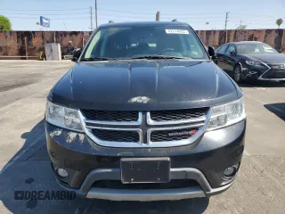 2015 Dodge Journey SXT with VIN 3C4PDCBG6FT718131, listed as a Copart auction lot 62214265 with 108,986 mi miles and Salvage title. Bid and sale history available at DreamBid. Image 5.