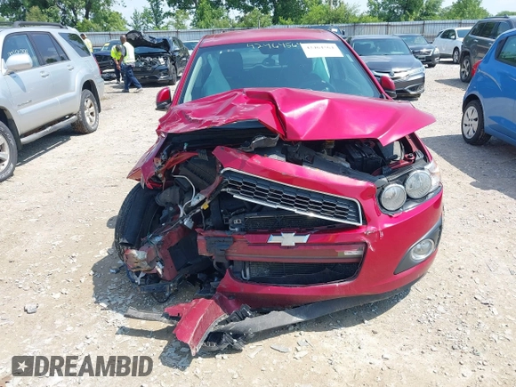 2012 Chevrolet Sonic LT with VIN 1G1JC6SH7C4135418, listed as a IAAI auction lot 42464564 with 169,035 mi miles and . Bid and sale history available at DreamBid. Image 6.