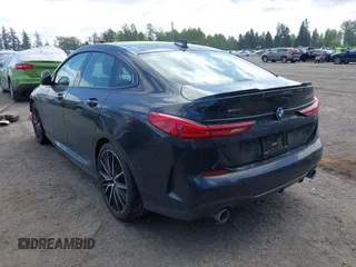 2020 BMW 2 Series 228i xDrive with VIN WBA73AK00L7F77132, listed as a IAAI auction lot 42129698 with 27,989 mi miles and . Bid and sale history available at DreamBid. Image 3.