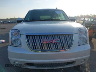 2012 GMC Yukon XL Denali with VIN 1GKS1MEF6CR138320, listed as a IAAI auction lot 42123524 with 184,182 mi miles. Bid and sale history available at carsss.com. Image 12.