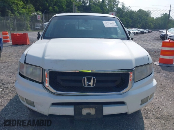 2010 Honda Ridgeline RTL with VIN 5FPYK1F58AB012526, listed as a IAAI auction lot 42421618 with 258,727 mi miles and . Bid and sale history available at DreamBid. Image 12.