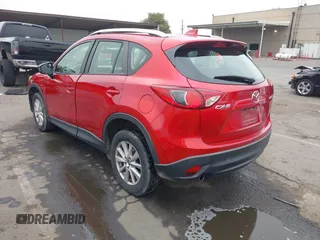 2015 Mazda CX-5 Sport z VIN JM3KE2BE9F0452625, wystawiony jako IAAI lot #42114867 z przebiegiem 167 849 mil mil oraz . Historia ofert i sprzedaży dostępna na DreamBid. Obrazek 3.