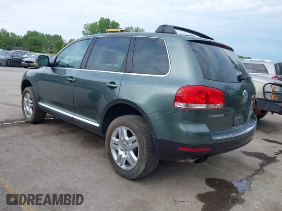 2004 Volkswagen Touareg with VIN WVGCM77L14D045663, listed as a IAAI auction lot 42170895 with 96,709 mi miles and . Bid and sale history available at DreamBid. Image 3.
