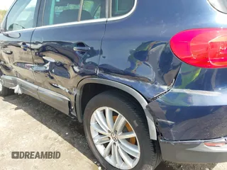 2012 Volkswagen Tiguan S with VIN WVGBV7AX3CW571039, listed as a IAAI auction lot 41928361 with 165,938 mi miles and . Bid and sale history available at DreamBid. Image 17.