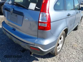 2007 Honda CR-V LX with VIN JHLRE38357C055256, listed as a IAAI auction lot 42050441 with 311,062 mi miles. Bid and sale history available at carsss.com. Image 6.