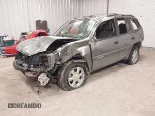 2005 GMC Envoy SLT with VIN 1GKDT13S352257892, listed as a IAAI auction lot 41690880 with 134,216 mi miles. Bid and sale history available at carsss.com. Image 2.