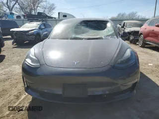 2021 Tesla Model 3 Standard Range Plus z VIN 5YJ3E1EA0MF089307, wystawiony jako Copart lot #50575465 z przebiegiem 131 251 mil mil oraz Szkody całkowita. Historia ofert i sprzedaży dostępna na DreamBid. Obrazek 5.