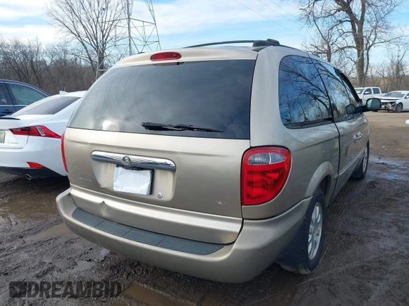 2002 Chrysler Town & Country EX with VIN 2C8GP74L62R524896, listed as a IAAI auction lot 41651240 with 128,983 mi miles and . Bid and sale history available at carsss.com. Image 4.