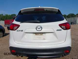 2015 Mazda CX-5 Sport with VIN JM3KE2BE6F0541469, listed as a IAAI auction lot 42632906 with 166,257 mi miles and . Bid and sale history available at DreamBid. Image 16.