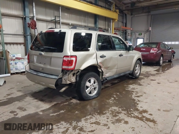 2011 Ford Escape XLT with VIN 1FMCU0D75BKB11168, listed as a IAAI auction lot 41327470 with 136,610 mi miles. Bid and sale history available at carsss.com. Image 4.