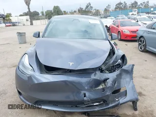 2023 Tesla Model Y Performance z VIN 7SAYGDEF1PF925274, wystawiony jako IAAI lot #42078813 z przebiegiem 20 422 mil mil oraz . Historia ofert i sprzedaży dostępna na DreamBid. Obrazek 11.