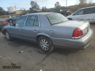 2006 Ford Crown Victoria LX with VIN 2FAHP74V46X115424, listed as a Copart auction lot 84219954 with 226,239 mi miles and Salvage Title. Bid and sale history available at carsss.com. Image 2.
